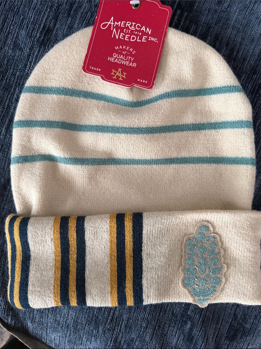 American Needle for FP Movement Cream Beanie with Teal, Navy & Gold Stripes